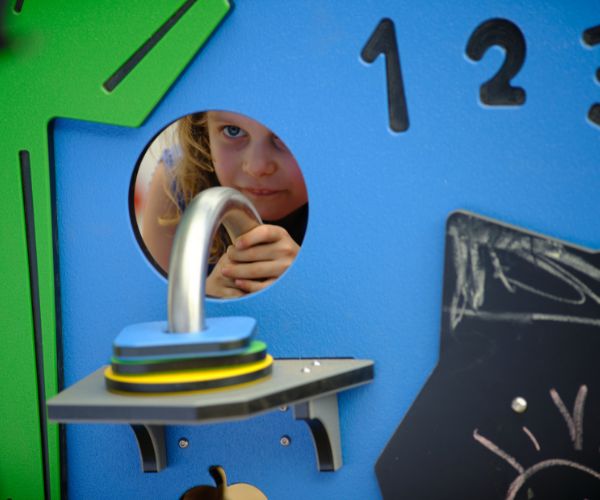 Child playing on sensory playboard